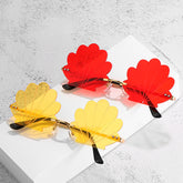 Randlose Retro-Sonnenbrille mit Muscheldesign
