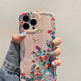 Funda para iPhone con diseño de flores en tonos pastel