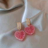Pendientes de corazón de cristal rosa