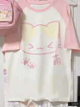 Camiseta suelta con diseño de gato pastel kawaii