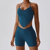 Conjunto de sujetador deportivo sin espalda y pantalones cortos con bolsillos