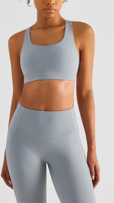 Sujetador deportivo ajustable con ganchos cruzados y sin espalda