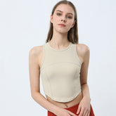 Camiseta de yoga sin mangas con dobladillo curvo