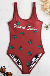 Traje de baño de una pieza reversible con espalda abierta y estampado floral y pata de gallo