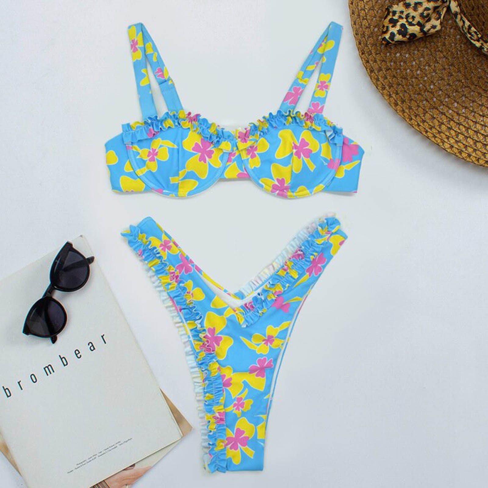 Top de bikini con aros y diseño balconette con volantes y estampado floral de colores azules