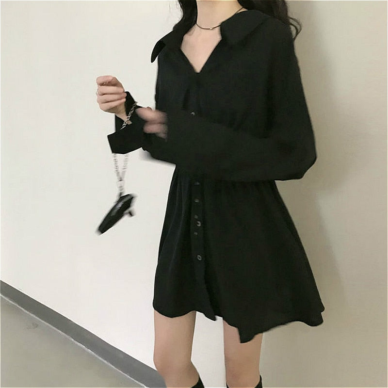 Elegante vestido negro de manga larga