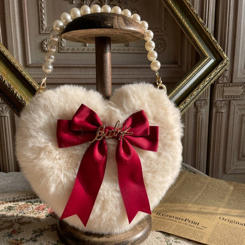 Bolsa de peluche con forma de corazón