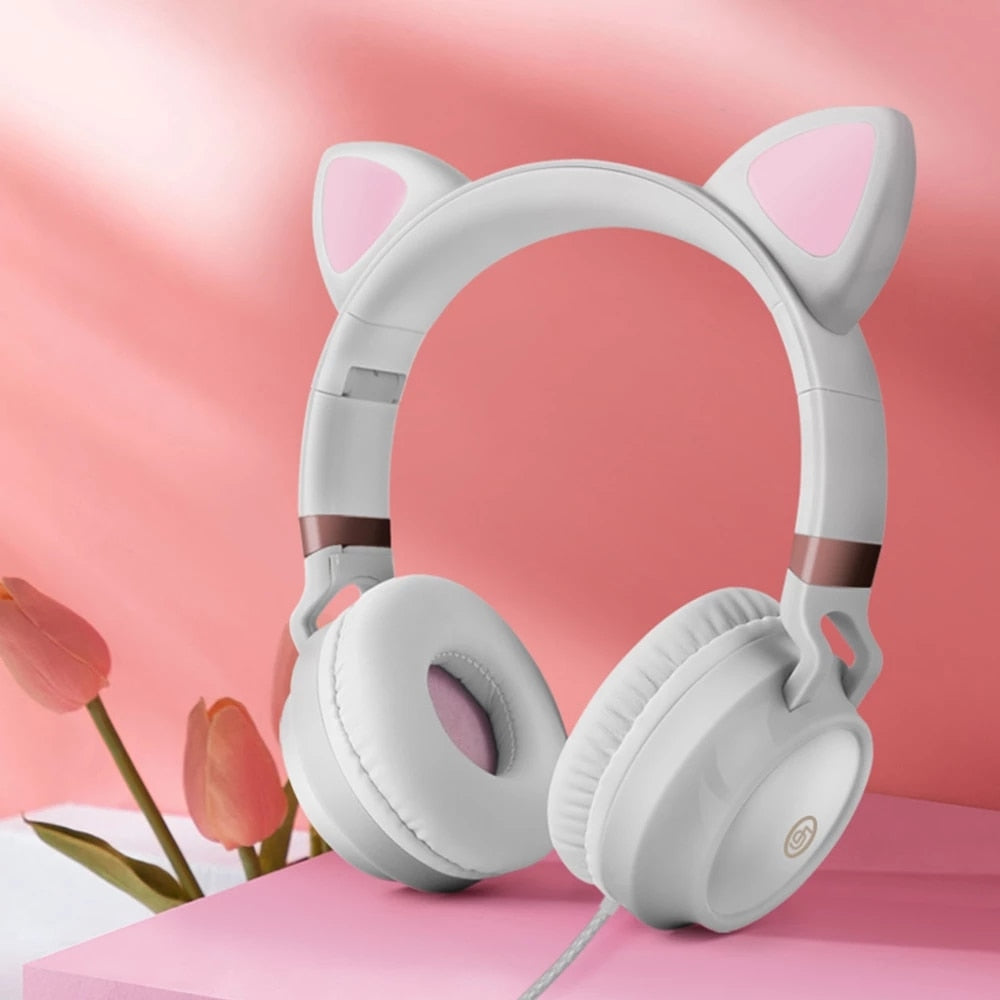 Auriculares con orejas de gato blancas