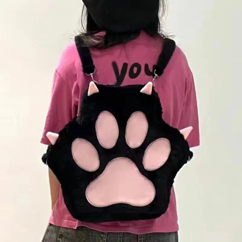 Bonita mochila con forma de garra de gato de peluche