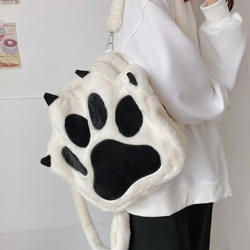 Bonita mochila con forma de garra de gato de peluche