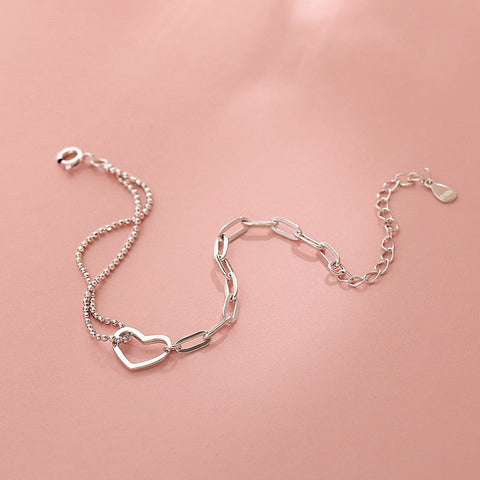 Pulsera de cadena con corazón de plata