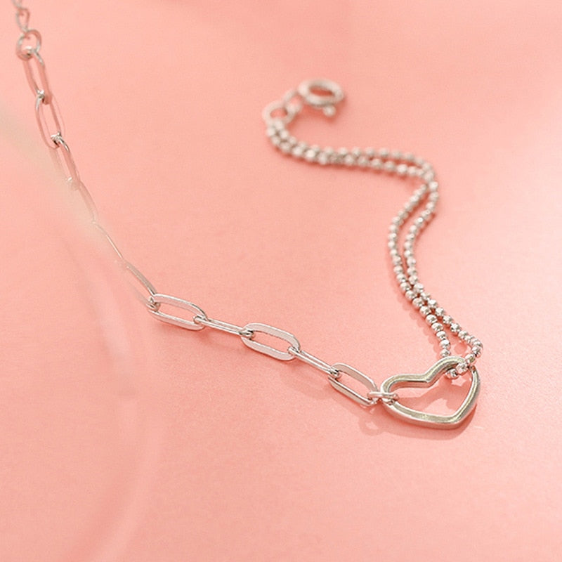 Pulsera de cadena con corazón de plata