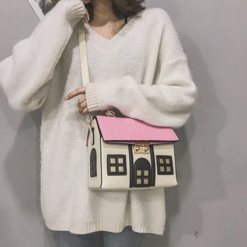 Lindo bolso de mano con forma de casa