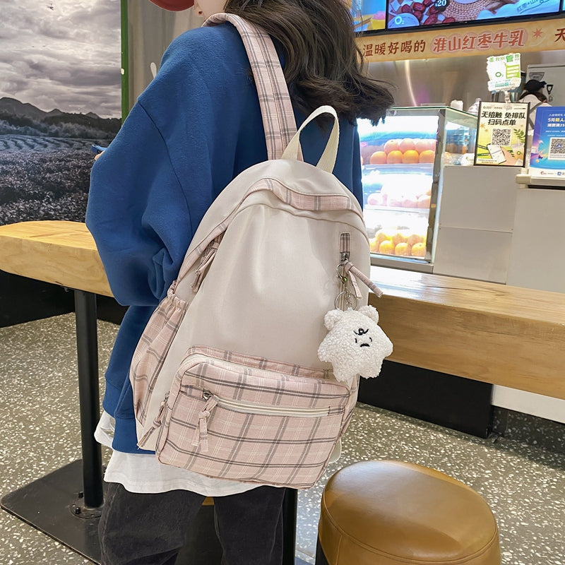 Gemütlicher karierter Schulrucksack