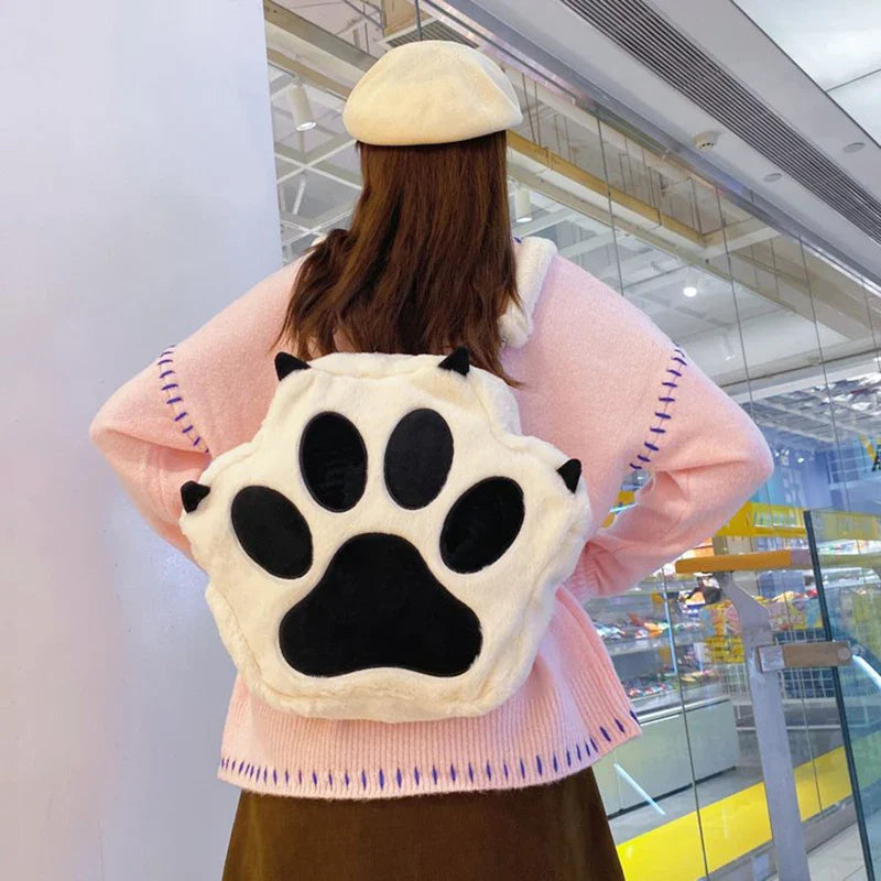 Bonita mochila con forma de garra de gato de peluche