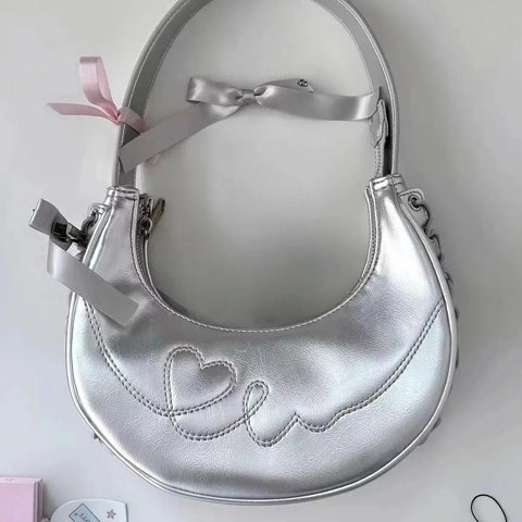 Lindo bolso plateado de Lolita 