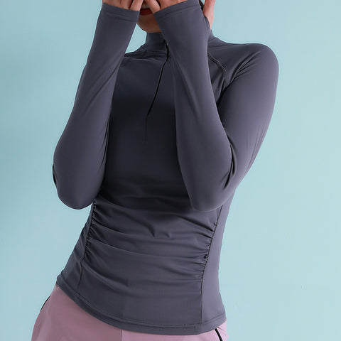 Camisa de yoga y deportes para mujer con mangas largas, cuello con cremallera y orificio para el pulgar