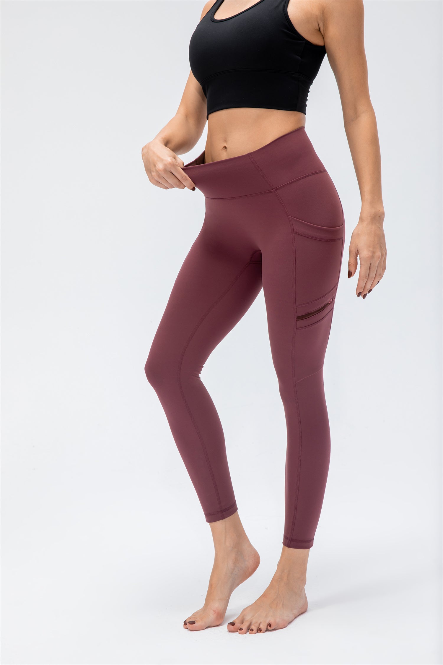 Sport-Leggings mit hoher Taille und zwei Taschen