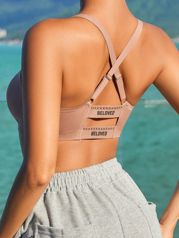 Bügelloses Bralette mit überkreuztem Rücken und Buchstaben-Print in Rosa