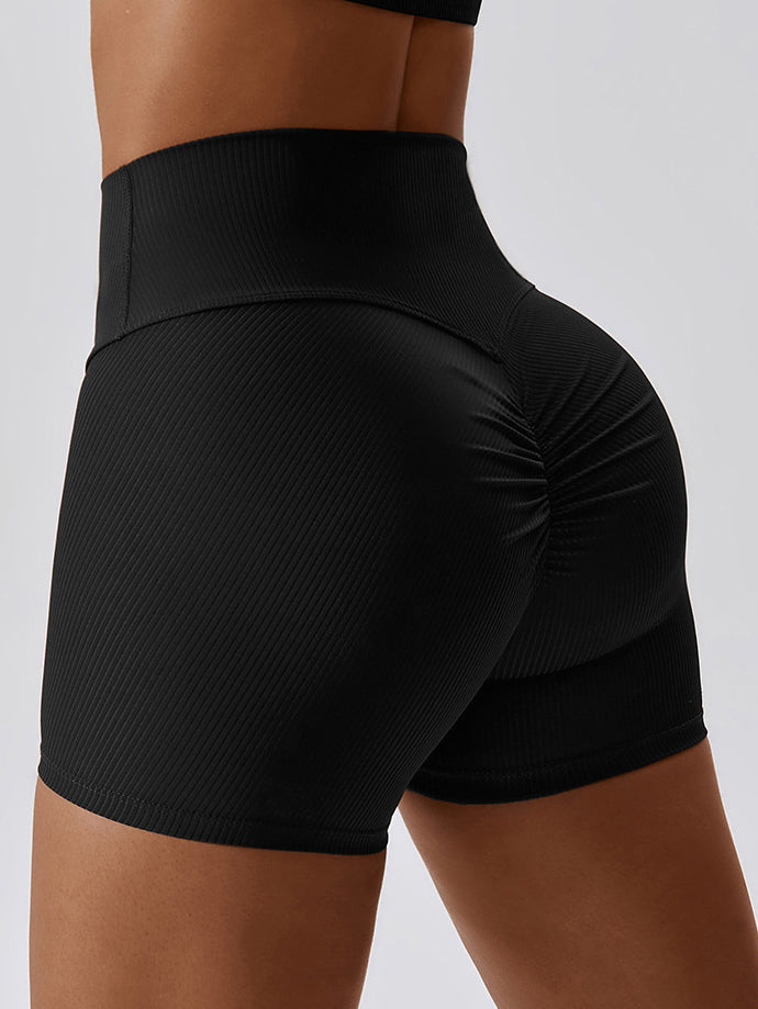 Pantalones cortos de yoga con ribete fruncido 