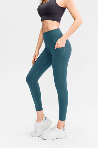 Leggings deportivos elásticos con bolsillos y cintura alta