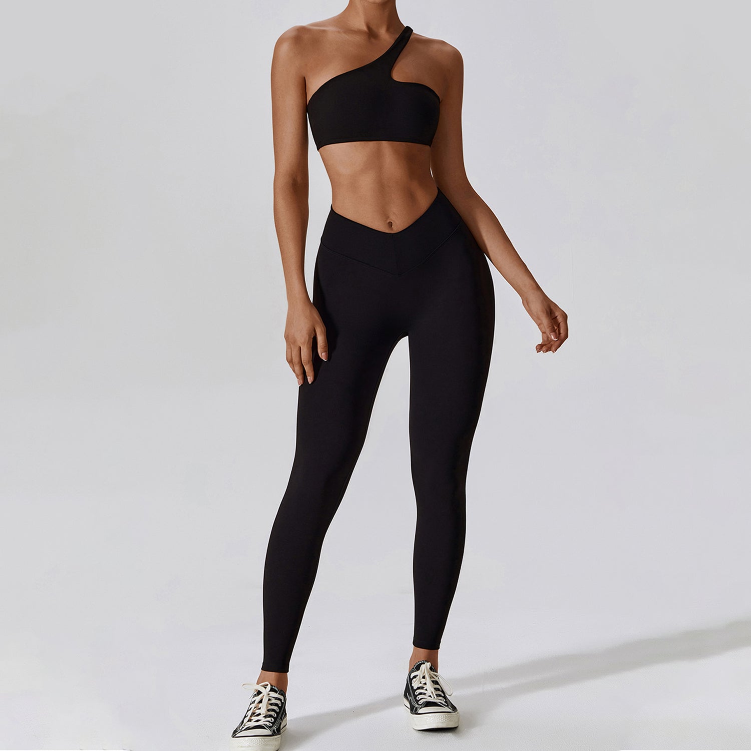 Unregelmäßiges One-Shoulder-Workout-BH- und Leggings-Set