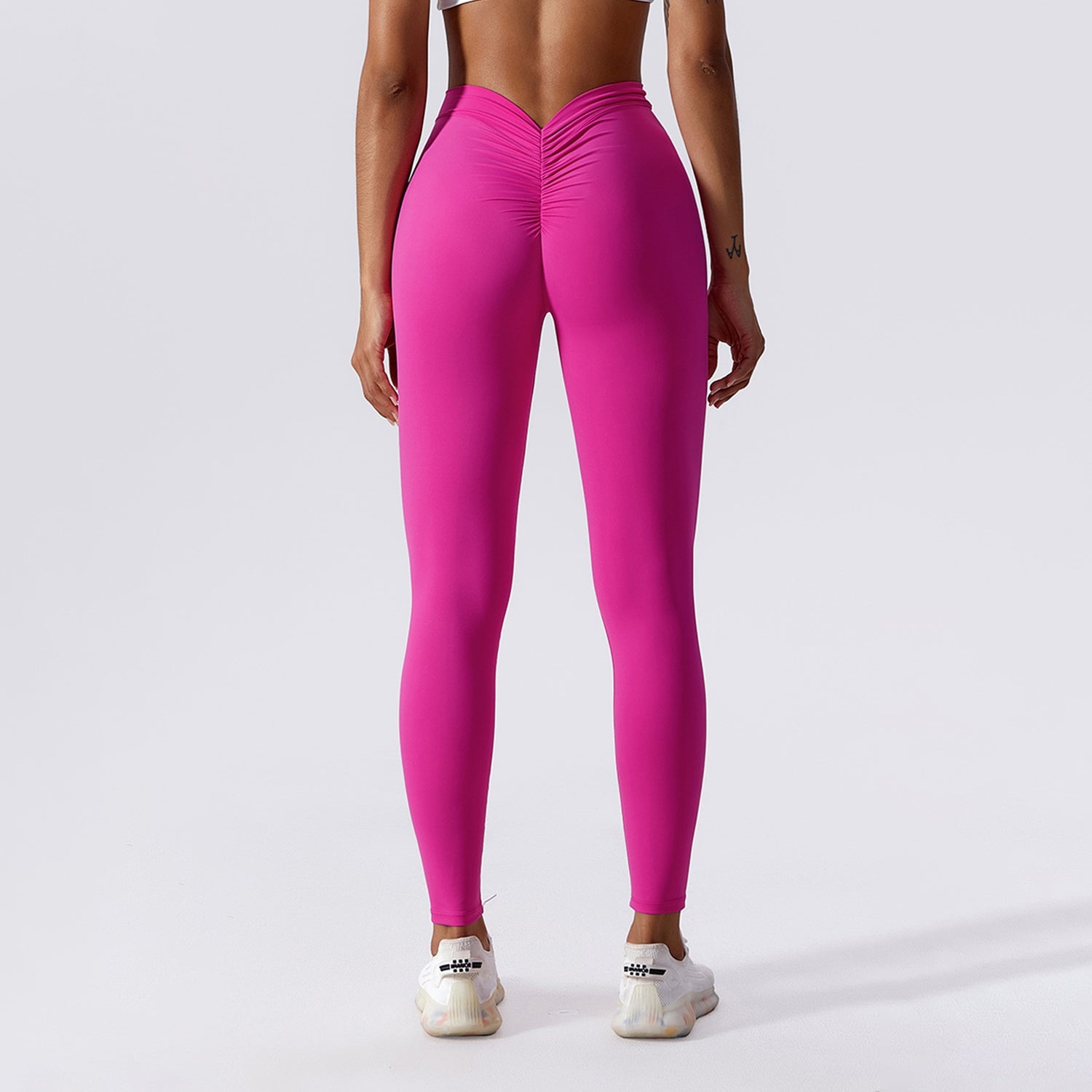 Gerüschte Leggings mit V-Rücken