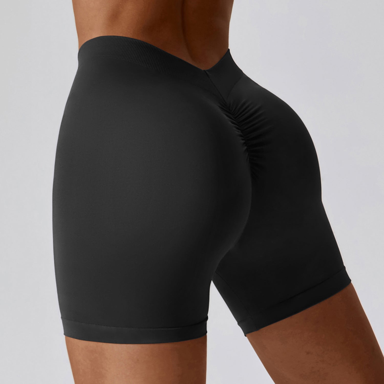 Pantalones cortos deportivos con realce de glúteos y espalda en V