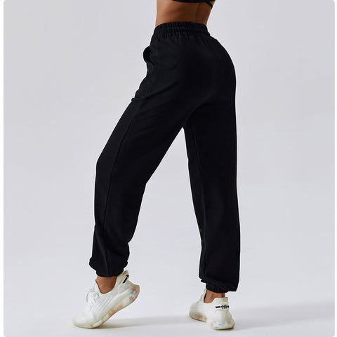 Pantalones deportivos casuales con bolsillos laterales y cordón