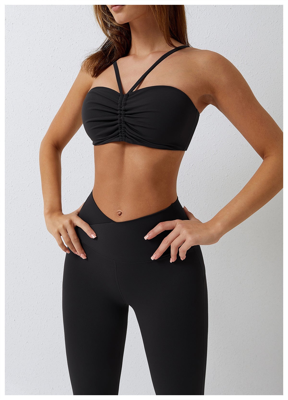 Conjunto de sujetador deportivo y leggings acampanados