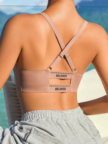 Bügelloses Bralette mit überkreuztem Rücken und Buchstaben-Print in Rosa