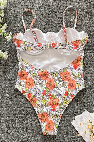 Traje de baño de una pieza con aros y estampado floral