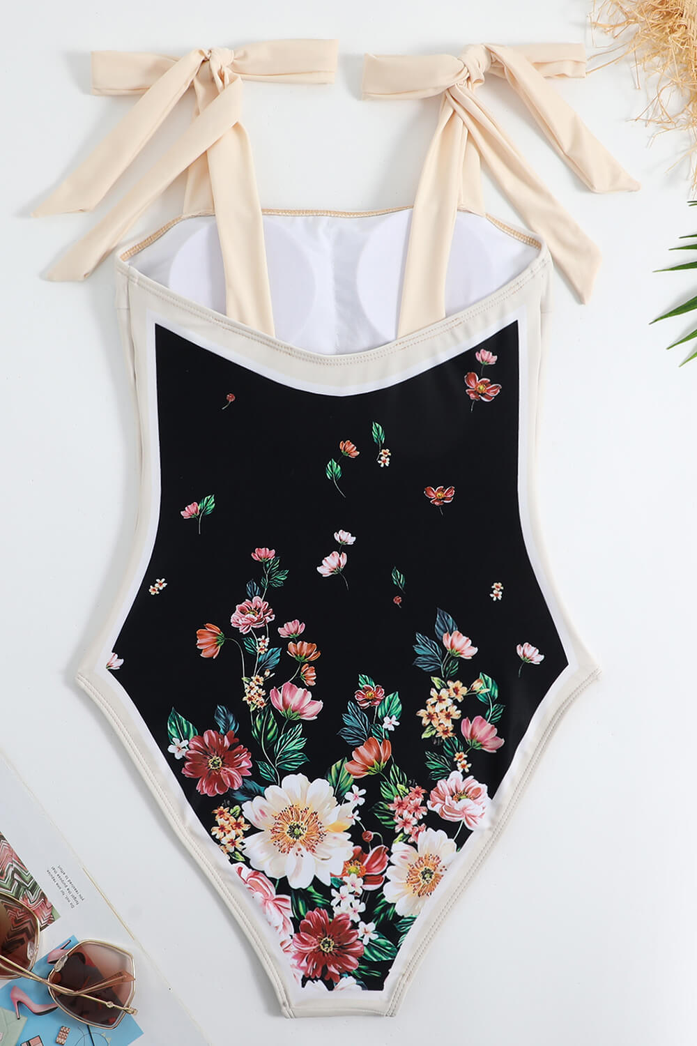 Traje de baño de una pieza con lazo en los hombros y estampado floral